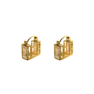 Detail view of gold-plated rectangular sugar cube zircon earrings with hollow geometric frames