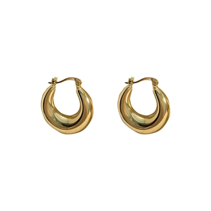 Macro shot of 18K gold-plated teardrop earrings with a mirror-finish and secure buckle