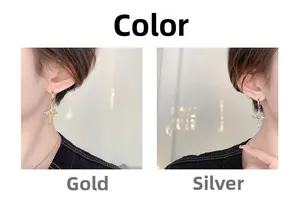 Detailed comparison of gold and silver cross star earrings inlaid with zircon crystals