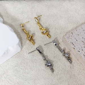 Zircon snake tassel earrings in 18K gold and silver plating with minimalist stones