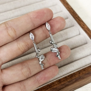 Snake-shaped silver drop earrings featuring sparkling zircon inlay and 18K gold plated finish