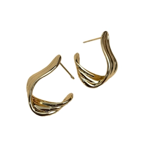 Modern wavy ribbon stud earrings in 18K gold plated copper with a polished finish