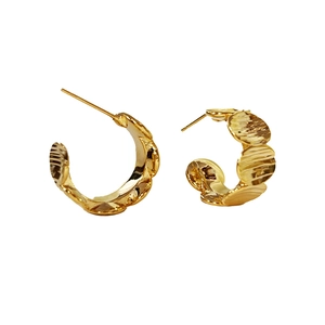 Minimalist C-shaped geometric hoop earrings with textured gold plating finish