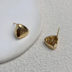 Elegant gold triangle earrings with hollow mesh texture and cubic zirconia inlay