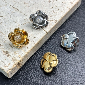 Elegant 18K gold plated camellia stud earrings with 5A cubic zirconia stones