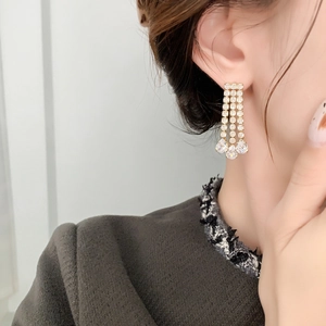 Elegant 18K gold plated tassel earrings with sparkling pavé stones and pear-cut zircons