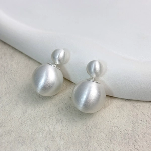 Minimalist silver matte brushed metal double ball stud earrings with two-sided design