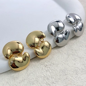 Minimalist double-layered bean geometric earrings in polished gold and silver finish