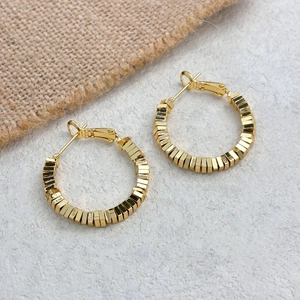 Fashionable 18K gold-plated cubic faceted hoop earrings with industrial geometric design