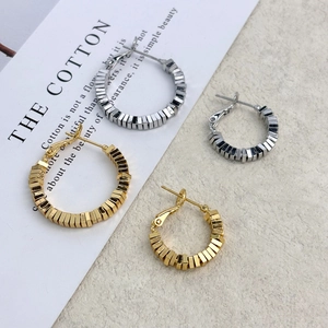 Fashionable geometric square beaded earrings in gold and silver finish, 45-degree angle view