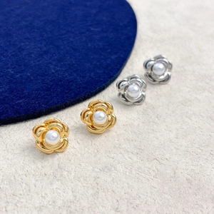 Mini camellia flower stud earrings in gold and silver with white pearl center detail