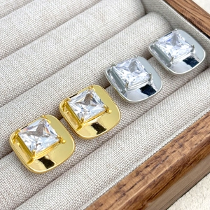 Luxe square-cut zircon stud earrings set in gold and silver plating with minimalist design