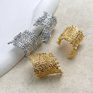 Modern woven mesh hoop earrings with sparkling zircons in gold and silver finishes