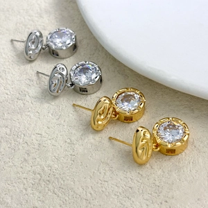 Fluid texture gold and silver stud earrings with round cut zircon and 18K gold plating