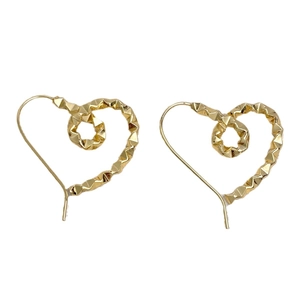 Minimalist gold heart earrings featuring unique 3D geometric spiral frame and polished finish