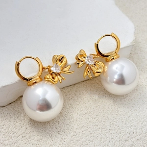 Boucles d'oreilles nœud en perles dorées et zircon cœur, bijoux de luxe femme