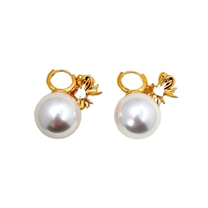 Élégantes boucles d'oreilles nœud en perles dorées au design minimaliste vintage pour femme