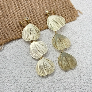 Three-tier fan-shaped gold earrings with radial texture and zircon stud in luxury style