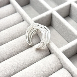 Minimalist multi-layer beaded open ring with silver finish shown in a jewelry display box