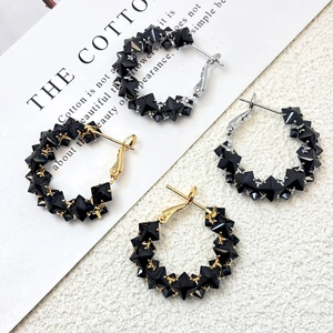 Elegant S925 silver hoop earrings with black zircon stones in gold and silver finish