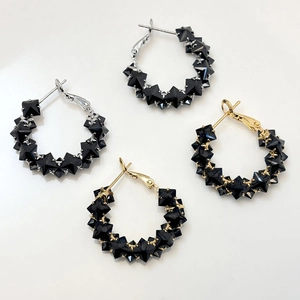 Elegant S925 silver hoop earrings with black zircon stones in gold and silver finish