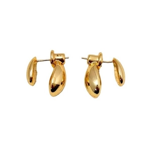 Polished gold irregular teardrop earrings with a unique minimalist streamlined metal design