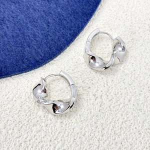 Polished silver twisted spiral hoop earrings with minimalist geometric design for women