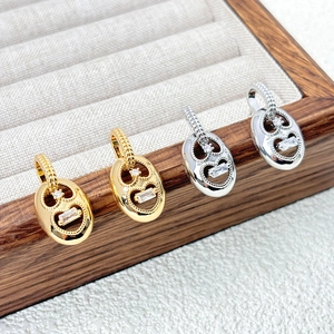 18K gold and silver oval earrings with pig nose link design and sparkling zircons