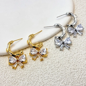 Chic sparkling bow drop earrings with heart cubic zirconia in gold and silver finish