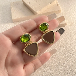 French retro stud earrings with green gemstone and brown resin in gold setting