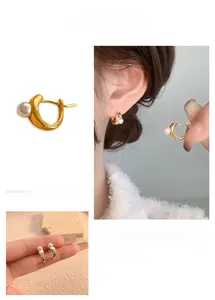 Detail of irregular 18K gold-plated earrings with pearls and model styling view