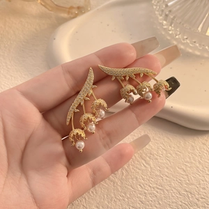 Elegant lily of the valley earrings with gold plating, sparkling zircons and white pearls