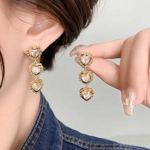French vintage gold triple heart drop earrings with shimmering zircon crystals