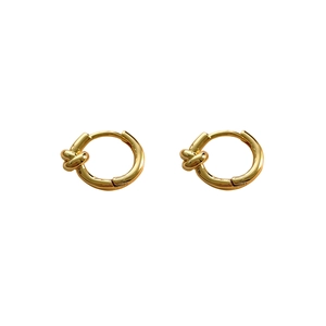 Minimalist gold knot geometric hoop earrings with polished finish on white background
