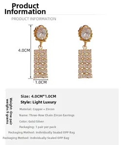 Detail of 4.0cm gold-plated chain earrings with black zircon tassels and measurements