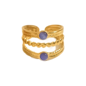 Detailed view of triple-layered gold band ring with purple gemstones and twisted texture