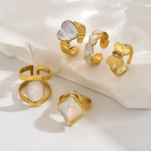 5-piece gold plated stainless steel ring set with opal hearts and butterfly charm