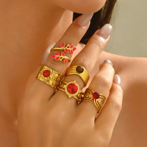 Five-piece 18K gold plated stainless steel ring set with zircon and red stone accents