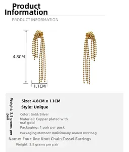 Detailed view of gold-plated tassel earrings showing 4.8cm length and specifications