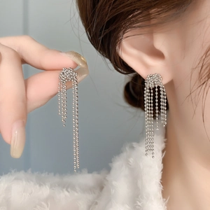 Elegant silver ball chain tassel earrings with layered bead fringe for a modern stylish look