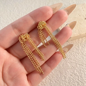 Elegant gold plated tassel drop earrings with beaded sphere and dangling bead chains