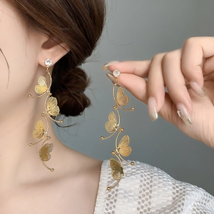 Elegant gold butterfly tassel earrings for women featuring sparkling cubic zirconia stones