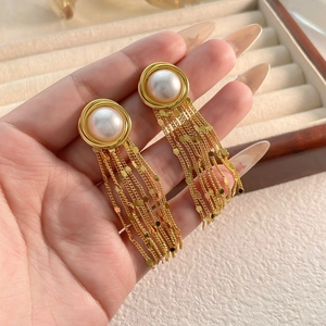 Elegant gold fringe earrings featuring white pearls and waterfall sequin chains for women