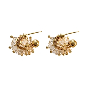 U-shaped horseshoe stud earrings with crystals and gold wire spiral design