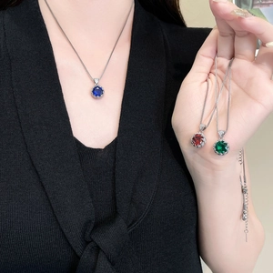 Elegant box chain necklace featuring sparkling zircon flower bud pendants in three colors