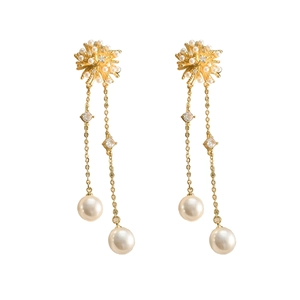 Long dangle snowflake earrings with white pearls and sparkling cubic zirconia crystals