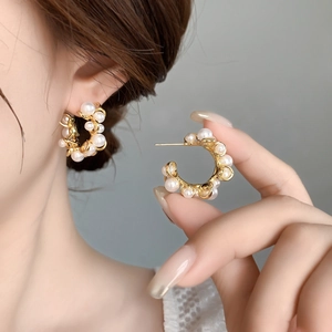Elegant gold brass C-shaped hoop earrings with inlaid white pearls for women