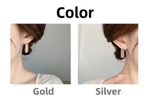 Detailansicht der Luxus-Metall-Feuerwerks-Fransenohrringe in Gold und Silber-Finish