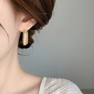 Elegante goldene mehrreihige Fransenohrringe mit funkelnden Strasssteinen für Damen