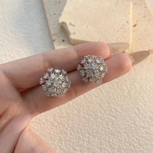 Minimalist silver snowflake stud earrings with sparkling zircon stones for women